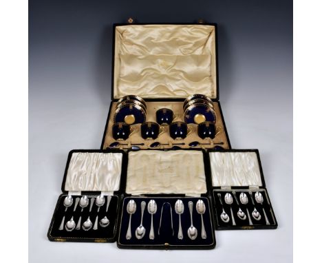 A cased set of Royal Worcester coffee cups, saucers and enamelled silver spoons, date code 1926, cobalt blue with Art Deco st