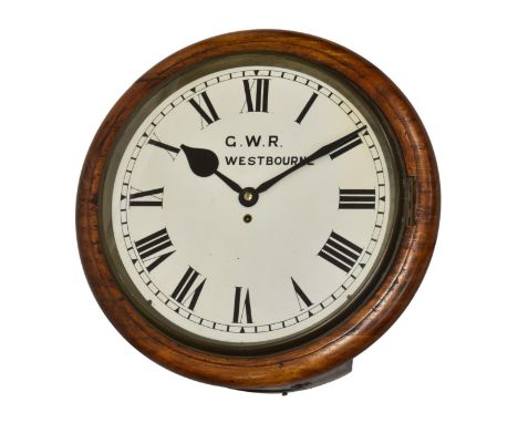 An impressive early 20th century mahogany cased GWR railway wall clock, with single fusee movement and white enamel dial, ins