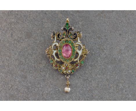 A 19th century Renaissance Revival gem set silver gilt pendant, the reversible open scrollwork pendant with lion and bearded 