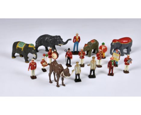 A collection of vintage hand painted lead circus figures, comprising of ring master, animal trainer, two clowns, various elep