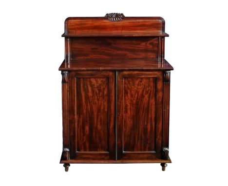 A fine late Regency mahogany collectors cabinet or chiffonier, the rectangular top with anthemion crested back and a single s