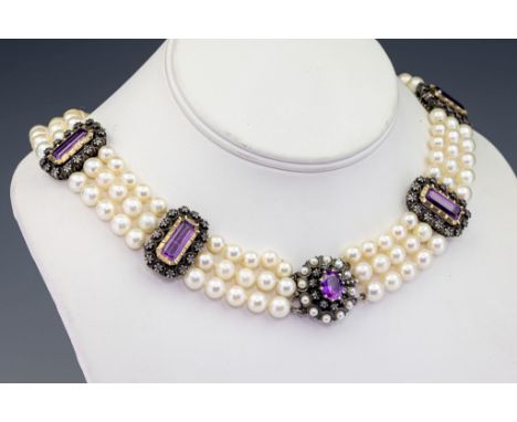 A three row cultured pearl and amethyst necklet, composed of three-rows of approx. 6-7mm. pearls, to silver gilt motifs and c