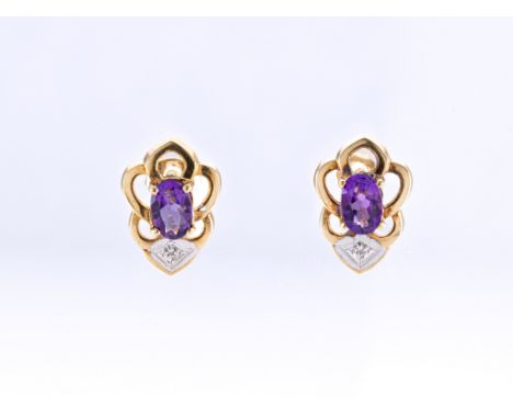 A pair of 9ct gold and amethyst earrings, each set centrally with an oval-cut amethyst, within a pierced surround and accente