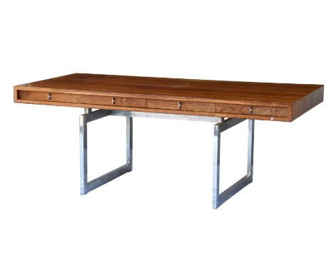 The James Bond Desk' - a Bodil Kjaer rosewood 'working table' desk, the shallow, rosewood veneered top with four frieze drawe