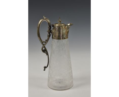 A Victorian etched glass claret jug with silver plate mounts, the clear glass body of conical form, etched with ornate floral