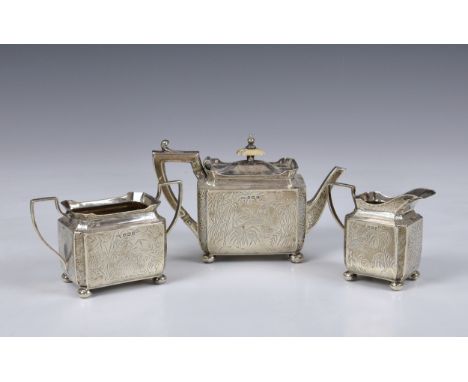 A three piece Victorian silver Aesthetic style bachelor's tea service, John Edward Bingham for Walker &amp; Hall, Sheffield, 