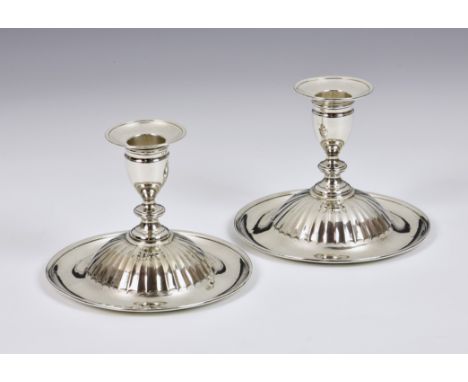 A pair of unusual George III silver candlesticks, John Touliet, London, 1791, the knopped column, having removable sconce, to
