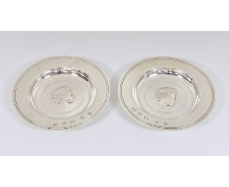 A pair of silver Queens Jubilee dishes, C J Vander Ltd, London, 1977, of circular form with deep dishes, having repoussé port