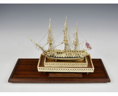 An early 19th century French prisoner-of-war bone and horn model of H.M. frigate 'Melpomene', with bound masts, yards with st