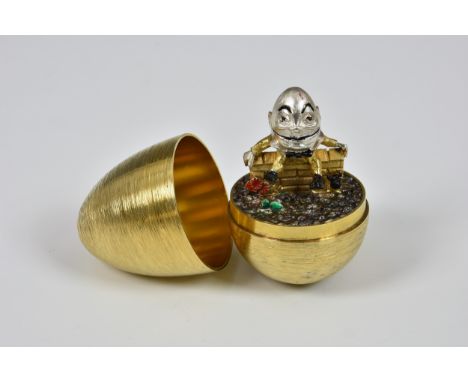 A Stuart Devlin limited edition silver gilt "Humpty Dumpty" surprise egg, with original paperwork, dating 15th March, 1976, c