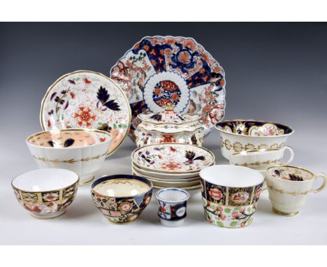 A collection of 19th century Staffordshire Imari pattern dinnerware and other Imari pieces, comprising a caddy &amp; cover, v