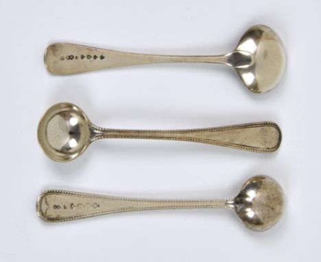 A pair of Victorian silver mustard ladles, Chawner &amp; Co., London 1861, Old English bead pattern; together with another Ol