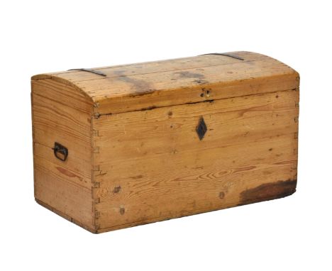 A Victorian waxed pine domed trunk, with iron side handles, strap hinges and diamond escutcheon, 35¼ x 19in. (89.5 x 48.25cm.