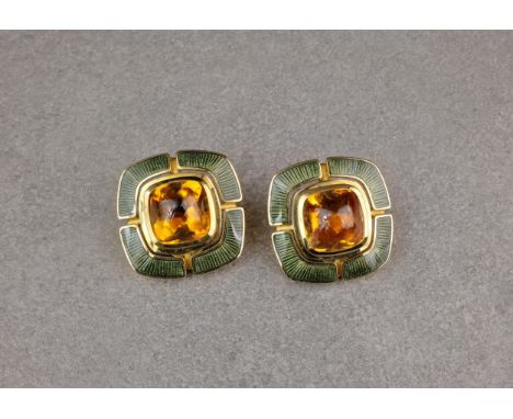 A pair of 18ct gold, citrine and enamel ear clips, by Leo De Vroomen, the mixed cabochon cut citrine held in a bezel setting 