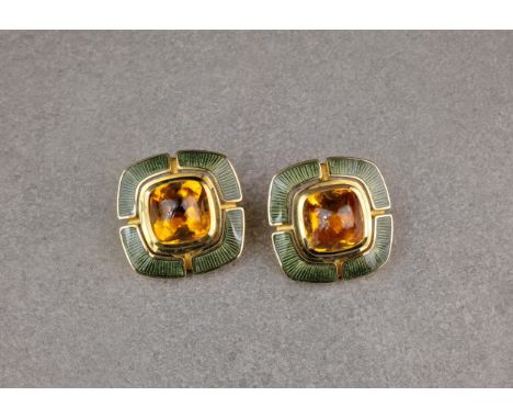 A pair of 18ct gold, citrine and enamel ear clips, by Leo De Vroomen, the mixed cabochon cut citrine held in a bezel setting 