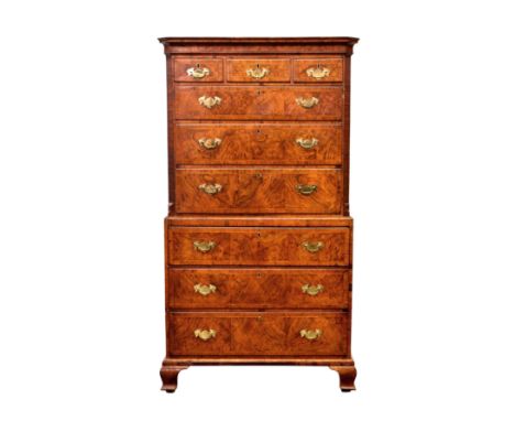 A George II walnut secretaire chest on chest, the ogee moulded cornice over three short and three long graduated drawers, fla