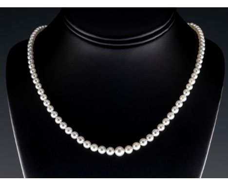 A single-strand cultured pearl necklace, the graduated row of 2.9mm-7.1mm cultured pearls, to an Art Deco style rose cut diam