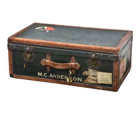 A dark green leather bound steamer trunk by Paul Romand of Paris, early 20th century, the dark green faux-leather exterior wi