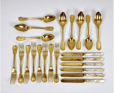 A part dessert set of gilt metal flatware by Christofle, c.1850, comprising of eight forks, one engraved with crest, eight sp