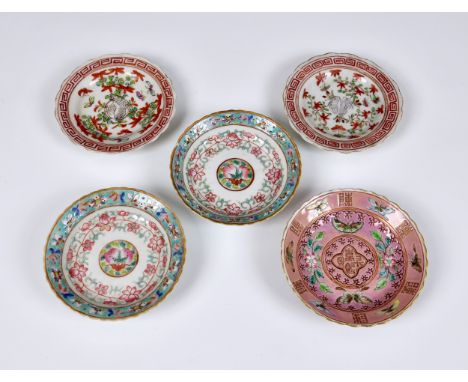 A pair of Chinese famille rose small dishes, Tongzhi (1862-74) seal marks and probably of the period, painted with a central 