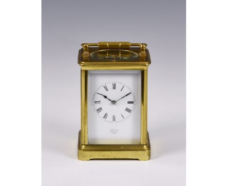 A late 19th century brass carriage clock by Richard &amp; Co, Paris,, retailed by John Walker, 230 Regents, London, with enam