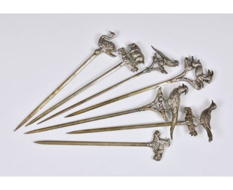 A set of seven figural animal French silver plate meat skewers, fashioned as pig, rabbit, swan, deer and three pheasant/game 