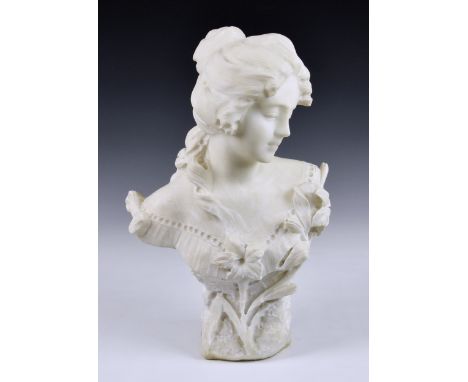 A fin de siècle white marble bust of a young maiden, with long hair looking left, wearing low cut dress adorned with flowers 