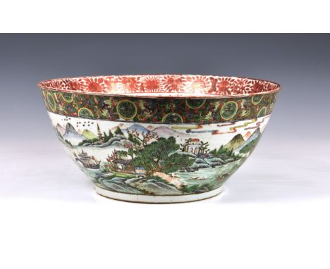 A large Chinese export porcelain Canton famille rose punch bowl, worn four character seal mark to base, 19th century, painted