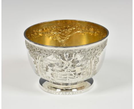 A George V embossed silver pedestal sugar basin, Hamilton &amp; Inches, Edinburgh, 1911, embossed with children playing on a 