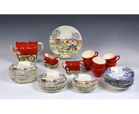 A Washington Pottery Ltd 'Wagon Trail' part tea service, three different designs, comprising a teapot, milk jug and sugar bas