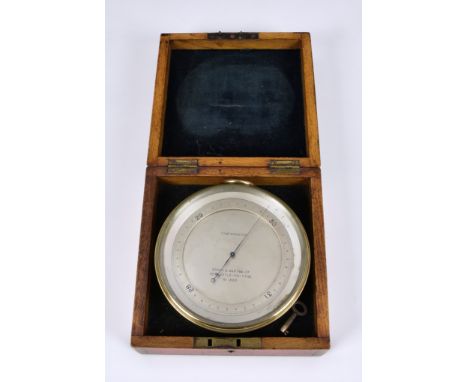 A compensated aneroid barometer by Brady &amp; Martin Ltd, Newcastle-on-Tyne, the 4 3/8in. silvered dial calibrated in inches