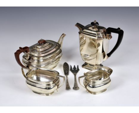 A George VI silver three piece tea service, William Suckling Ltd, Sheffield, 1945/46/47, comprising a teapot, 11in. (28cm.) l