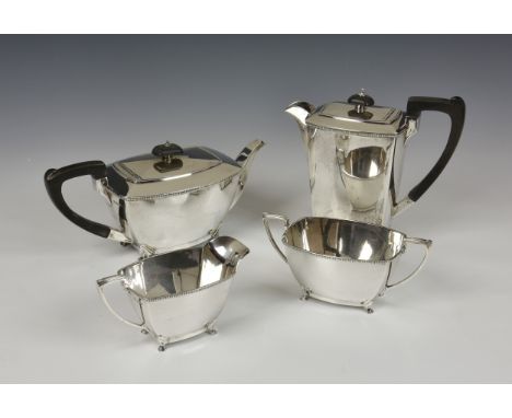 A George VI silver four piece tea service, Harrison Brothers &amp; Howson, Sheffield, 1947, comprising teapot, hot water pot,