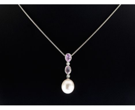 An 18ct white gold, pink sapphire, diamond and pearl drop pendant necklace, the pearl drop, 1.2 x 1.0cm, suspended from a row