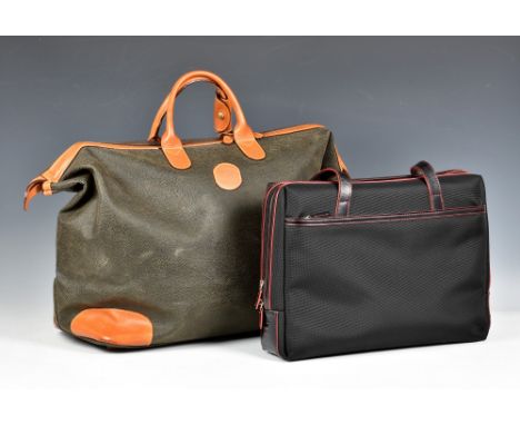 A Brics of London leather trimmed weekend bag, as new condition, in dark grey-green, with tan lather trim, top handles, gold 