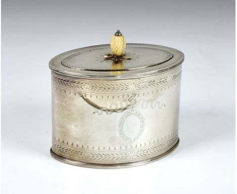 A George III silver tea caddy, Alexander Field, London, 1797, of navette form with bright cut engraved stylised foliate bands