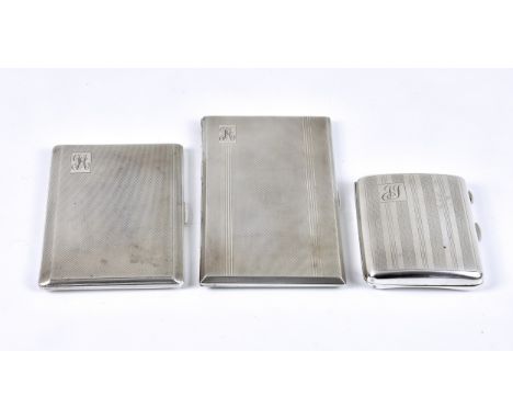 A collection of three silver cigarette cases, to include a rectangular engine turned version by TLD, Birmingham, 1946, having