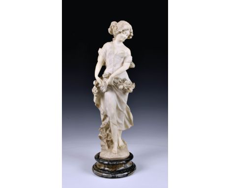 A large resin faux-parian ware figure of a young maiden, holding a garland of flowers, raised on a waisted circular variegate