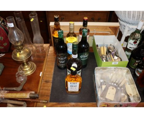 A bottle of Highland Black Scotch Whisky, Famous Grouse Whisky, Three Barrels French Brandy etc.
