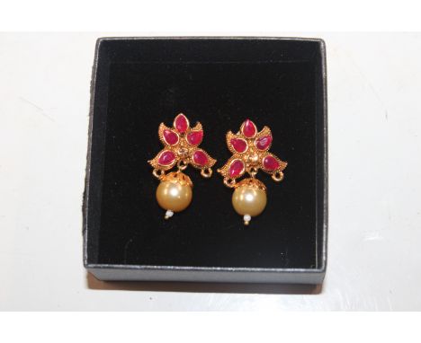 A pair of Indian ruby and pearl ear-rings 