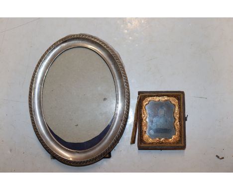 An oval silver photo frame AF; and a Daguerreotype 