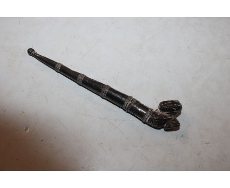 A white metal mounted pipe 