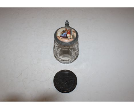 A cut glass tankard with porcelain and pewter lid; and a circular snuff box, decorated with hunting scene AF