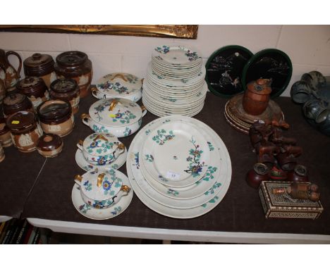 A Haviland Limoges part dinner service comprising graduated meat plates, tureens, dinner and tea plates etc.