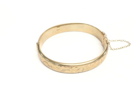 A 9ct gold bangle 13.3g approx (postage A)