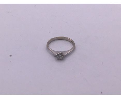 An 18ct white gold diamond solitaire (size K) (a) approx 1.7g