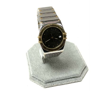 A vintage gents Omega Constellation bi metal tone finish, 34mm includes crown. (B)