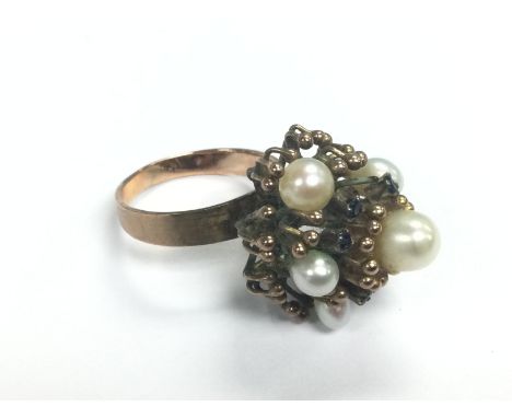 A 14k gold and pearl ring, approx 6.4g and K-L. (U4a). Shipping category A.