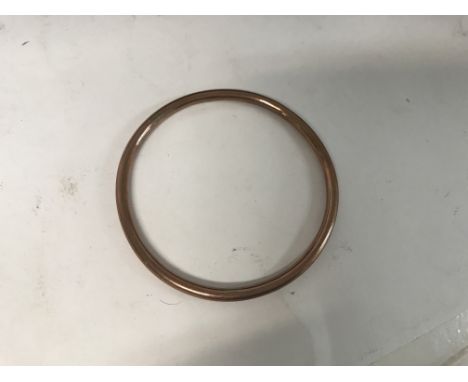 A gold bangle presumed loaded core approx 13.2g (a)
