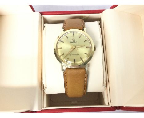 Vintage boxed Omega sea master circa 1960 cal.600 14K gold cased. Seen working. (B)